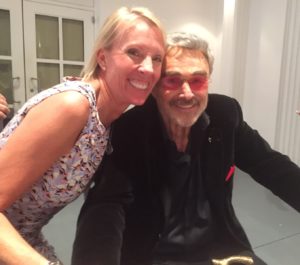 Author Cathy Helowicz with Burt Reynolds at the Festival. 