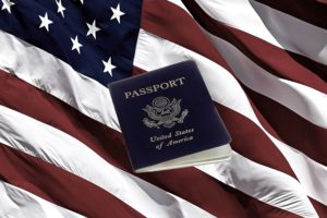 Us Passport And American Flag