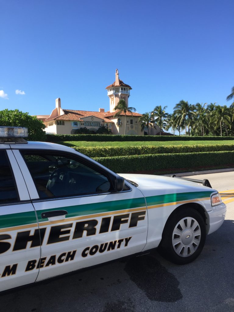 Sheriff Dept. vehicle stationed in front of Mar-a-Lago